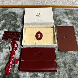 Must De Cartier Trifold Burgundy Leather Wallet w/ card, box, cloth & ribbon